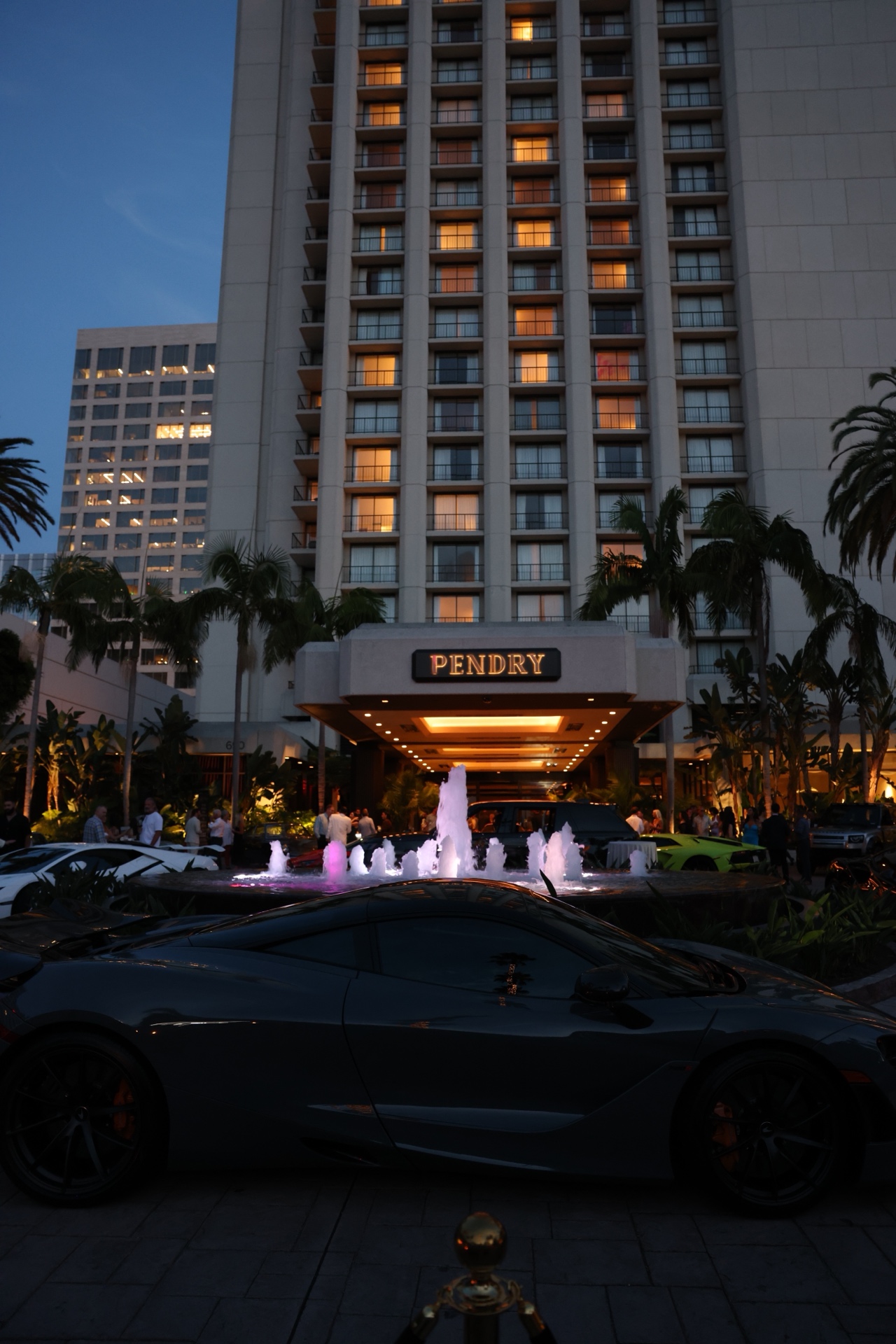 Automobiles and guests at the Pendry Newport Beach Concours at Sunset showcase